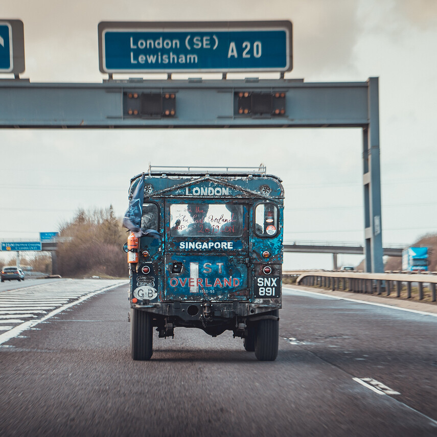 Close-up of a Land Rover from behind on the highway